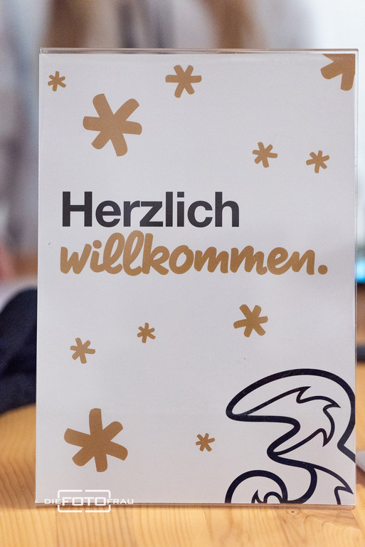 Willkommensschild Drei Business